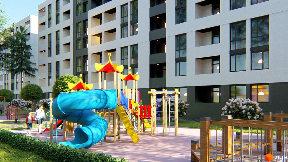 Житловий комплекс Щасливий: фасади будівель з великими вікнами та дитячий майданчик з гірками та гойдалками.