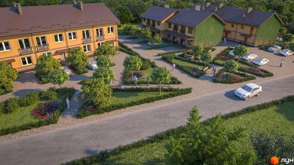 Зовнішній вигляд двоповерхових будинків з жовтої цегли та зеленим фасадом. Прибудинкова територія з деревами, квітами та припаркованими автомобілями.