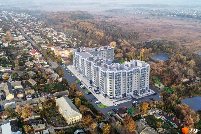 Житловий комплекс М'ятний - це багатоповерхові будинки сірого та блакитного кольору з великою кількістю вікон, розташовані серед приватної забудови та осіннього лісу.