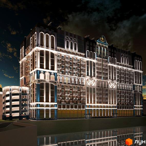 Зовнішній вигляд житлового комплексу Колумб (Зелений Мис) з багатоповерховими будівлями та архітектурними елементами, освітленими вночі. На зображенні видно фасади будівель, вікна та балкони.