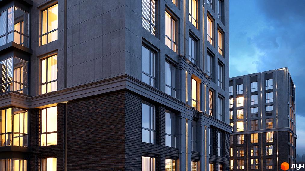 Житловий комплекс GENEVE з цегляним цоколем та сірим фасадом. Вечірнє освітлення підкреслює архітектурні елементи будівлі.