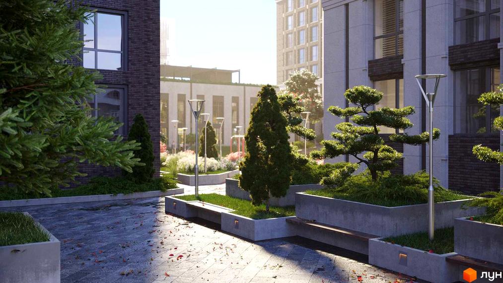 Житловий комплекс GENEVE: сучасний фасад будинку з великими вікнами та доглянута прибудинкова територія з ландшафтним дизайном. Зелені насадження та зручні лавки створюють затишну атмосферу.