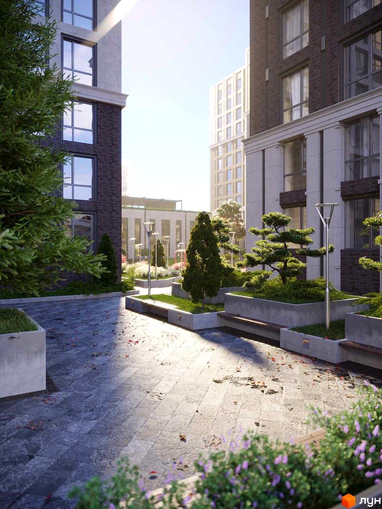 Житловий комплекс GENEVE: фасади будинків з темної цегли та світлого каменю, прибудинкова територія з доглянутими рослинами та бруківкою.