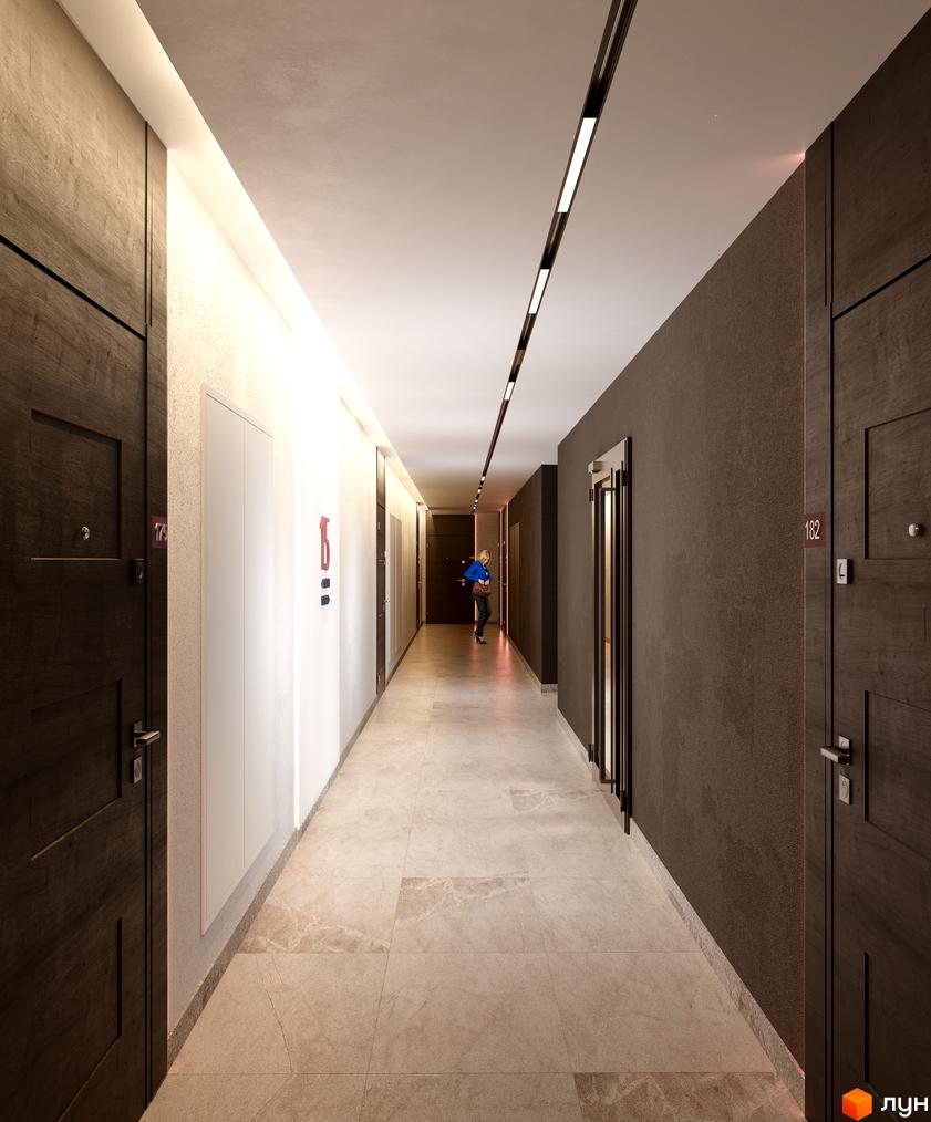 Сучасний коридор новобудови ЖК Берег Дніпра з дверима та ліфтом. Оздоблення стін та підлоги виконано в нейтральних тонах.