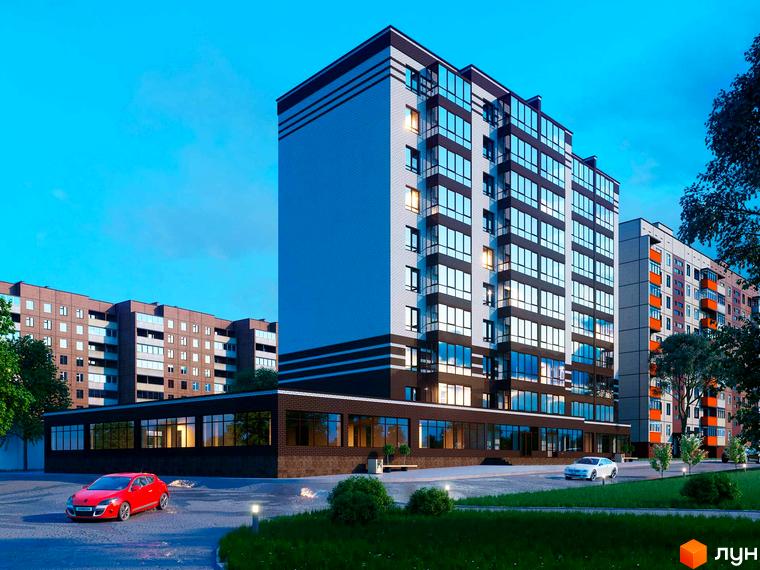 Зовнішній вигляд новобудови ЖК Егоїст з панорамними вікнами та цегляним фасадом. На прибудинковій території видно автомобілі та зелені насадження.