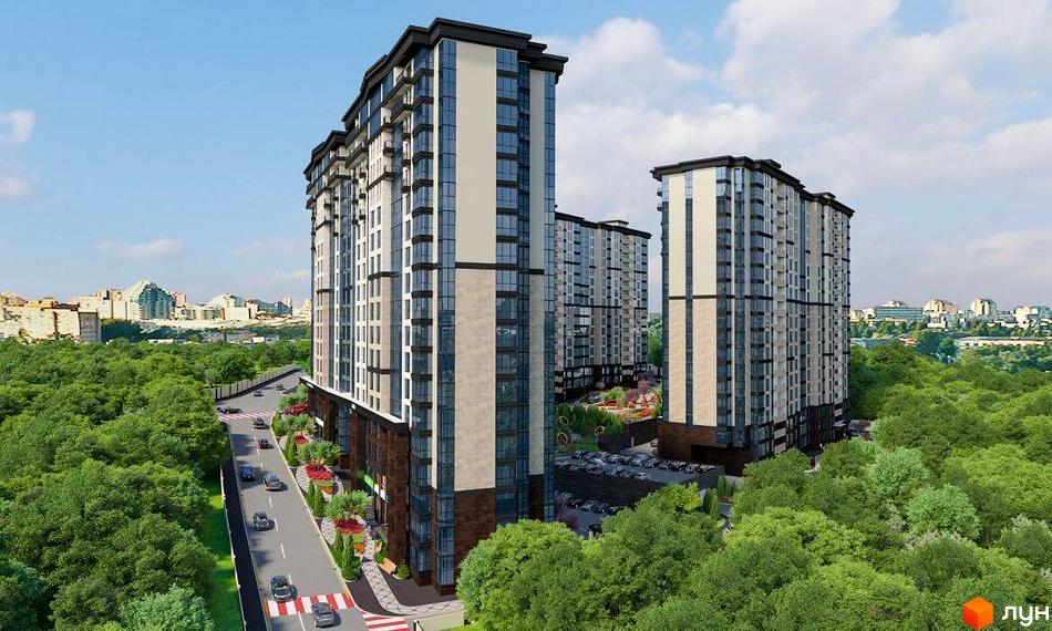 Зовнішній вигляд житлового комплексу Crystal Towers з високими будівлями та скляними фасадами. Прибудинкова територія з дорогою та зеленими насадженнями.