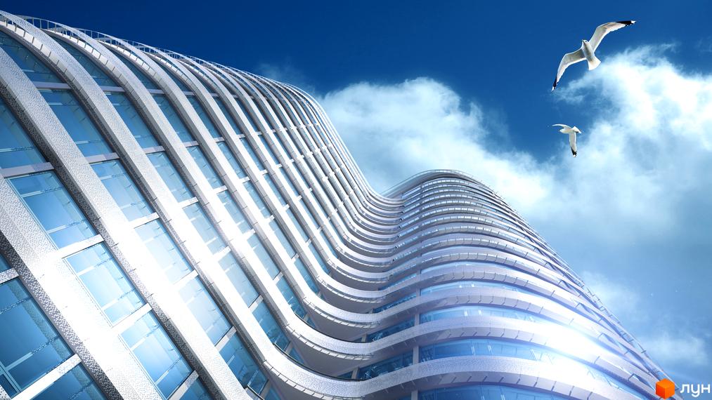 Житловий комплекс OASIS з хвилястим фасадом та скляними вікнами, що відображають небо та хмари. Над будинком летять два чайки.