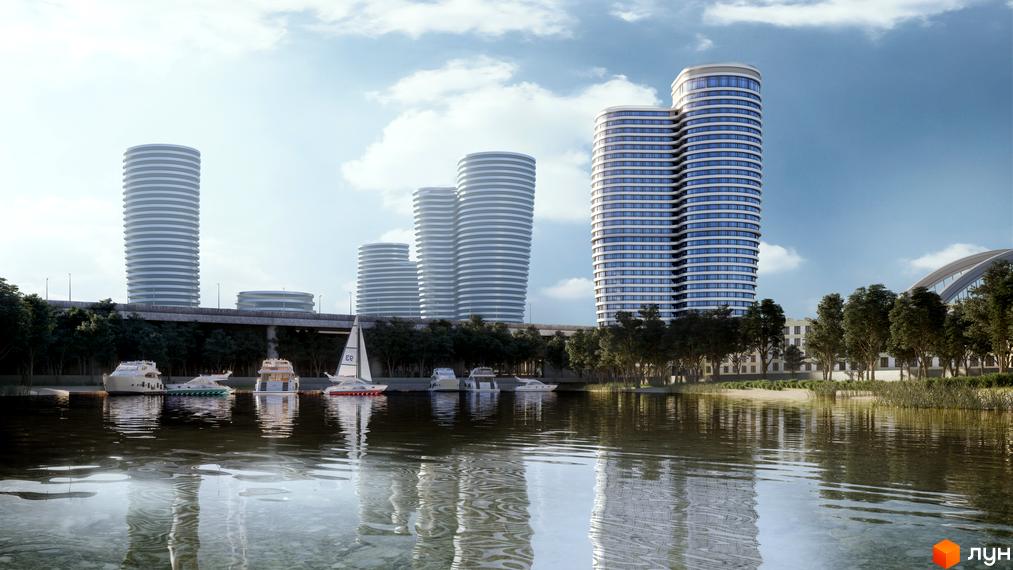 Житловий комплекс OASIS з футуристичними вежами на березі річки з яхтами. Навколо зелені дерева та хмарне небо.