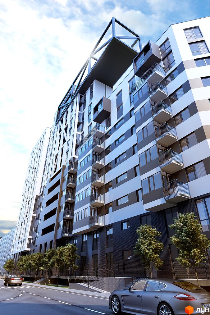 Зображення фасаду будинку на вул. Героїв УПА, 73. Багатоповерхова будівля з балконами та великими вікнами. Перед будинком дорога з автомобілями та невеликі дерева.