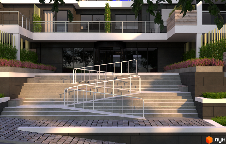 Фасад Новобудови HillSide виконаний у темних тонах з білими елементами та великими вікнами. Перед входом розташовані широкі сходи з пандусом та зелені насадження з квітами.