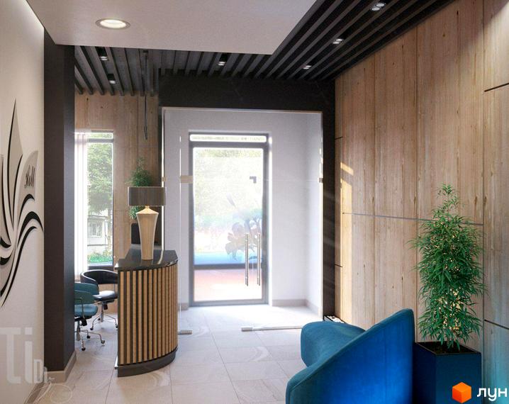 Дизайн рецепції ЖК Лотос Холл з дерев'яними елементами та синім диваном. Сучасний інтер'єр холу новобудови.