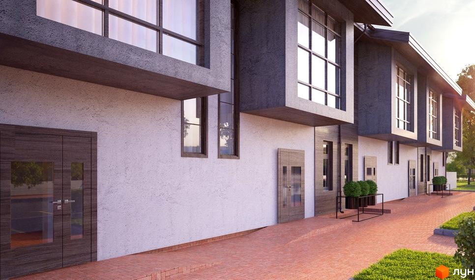 Зображення фасаду таунхаусу Good House. На фото видно вхідні двері, вікна та прибудинкову територію з бруківкою та газоном.