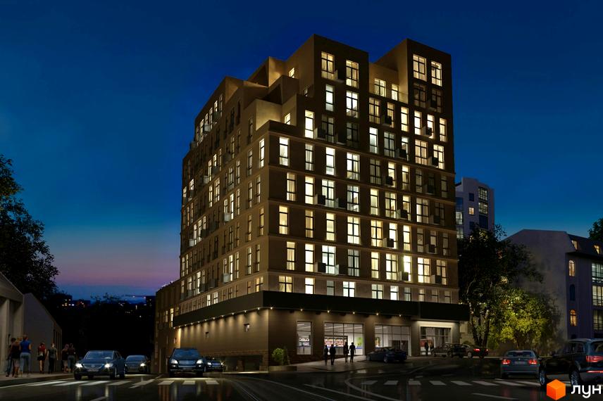 Житловий комплекс Будинок на Фонтанській вночі з освітленими вікнами та автомобілями на парковці. Навколо будинку розташовані дерева та сусідні будівлі.