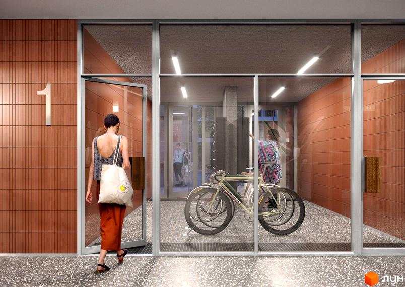 Вхід до Житлового комплексу 044 з фасадом з вертикальної теракотової плитки та скляними дверима. Всередині видно парковку для велосипедів.