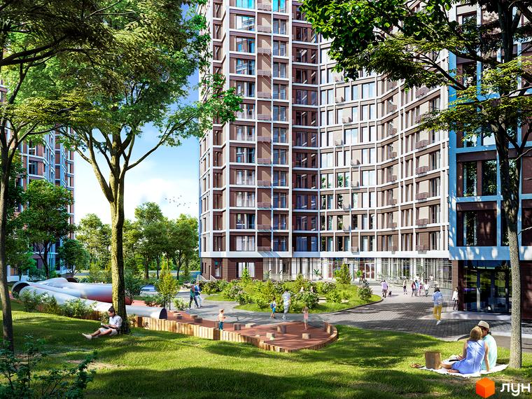 Житловий комплекс Echo Park 2 з високою багатоповерховою будівлею та зеленою прибудинковою територією з місцями для відпочинку.
