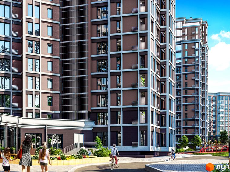 Житловий комплекс Echo Park 2 з коричневими фасадами та білими елементами. На прибудинковій території дитячий майданчик та зелені насадження.