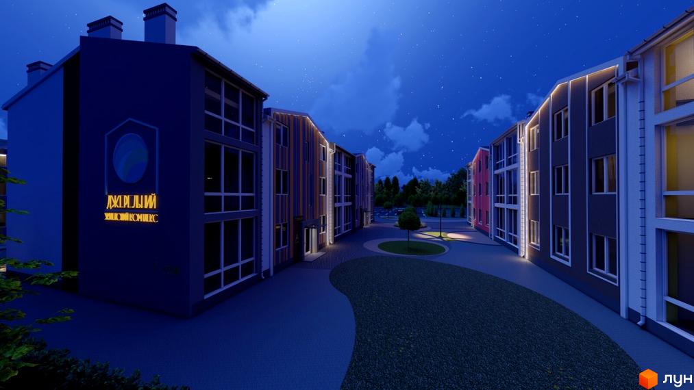 Зображення фасаду та подвір'я Житлового комплексу Джерельний вночі. На фото видно освітлені будинки та зелену прибудинкову територію.