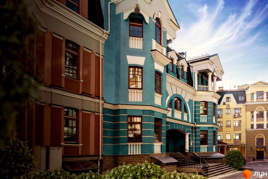 Житловий комплекс Воздвиженка з яскравим фасадом та прибудинковою територією, оформленою зеленими насадженнями.