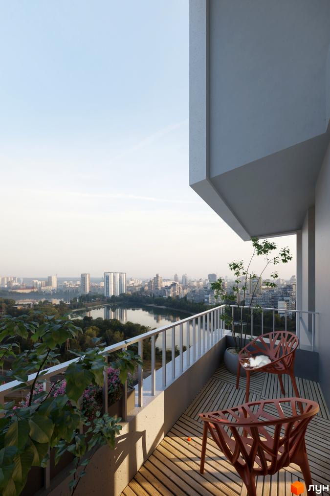 Вид з балкону на місто у Житловому районі BOSTON Creative House. На балконі розташовані крісла та рослини.