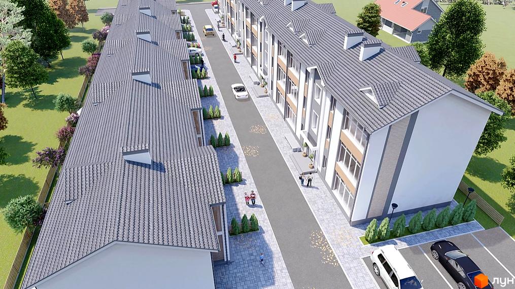 Зображення Житлового комплексу Екологічний з виглядом на фасади будинків та прибудинкову територію з деревами.