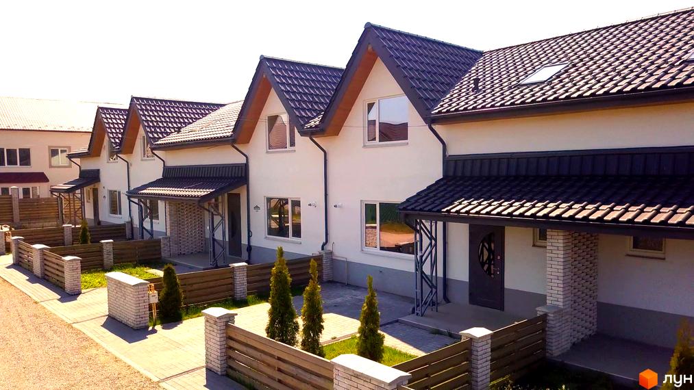 Зображення таунхаусів у Котеджному містечку „Екологічний“ (Рибацька). Вигляд будинків та прибудинкової території.