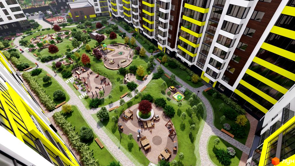 Висока багатоповерхова новобудова з жовтими акцентами на фасаді. На прибудинковій території розташовані дитячі майданчики, зони відпочинку та зелені насадження.