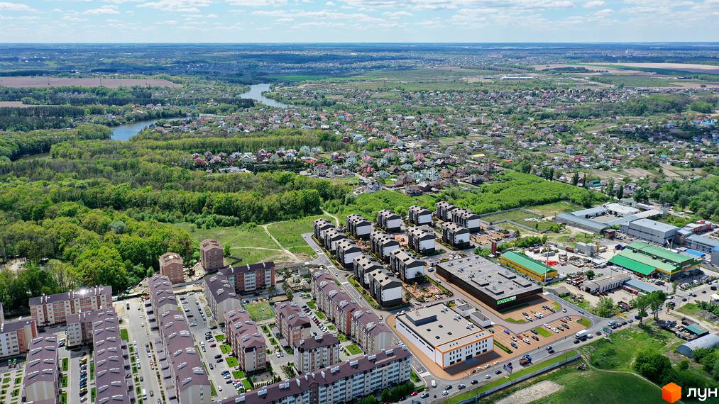 Житловий комплекс Молодіжне містечко. Сучасні багатоповерхові будинки з прибудинковою територією та парковкою.