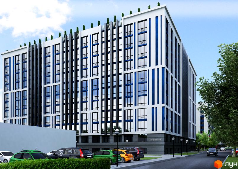 Новобудова ЖК Рів'єра з біло-синім фасадом та великою кількістю вікон. Прибудинкова територія з зеленими насадженнями та автомобілями.