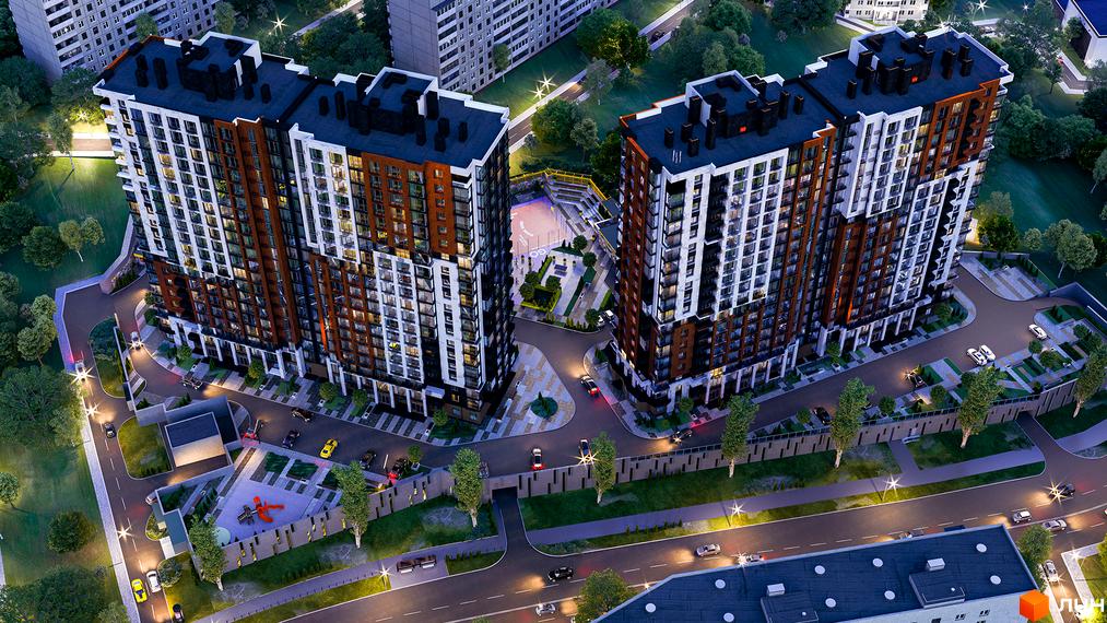 Вигляд з висоти на дві багатоповерхівки Житлового комплексу CITY HUB з облаштованою прибудинковою територією.