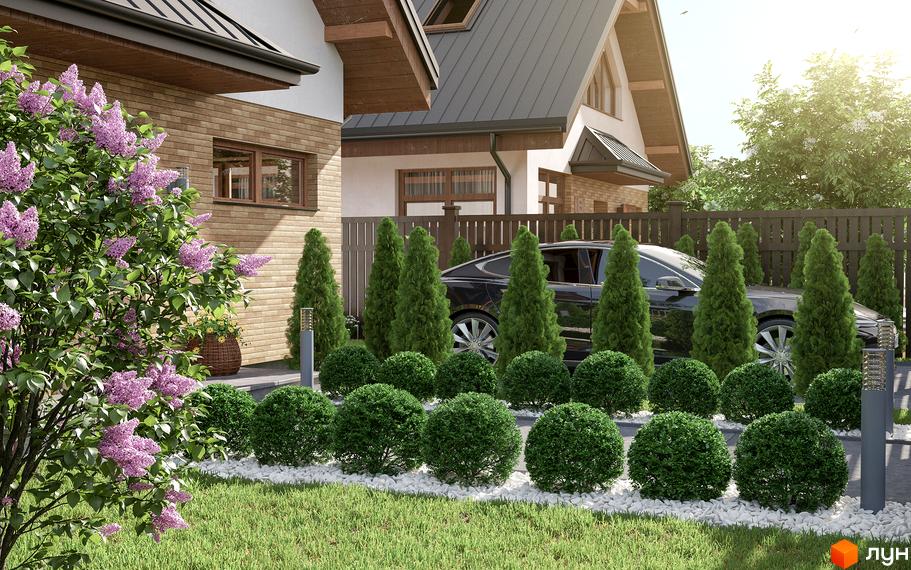 Зовнішній вигляд будинку КМ Liberty з цегляним фасадом та ландшафтним дизайном прибудинкової території з зеленими насадженнями.