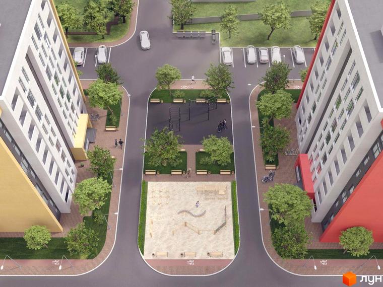 Вид зверху на будівлі ЖК Андріївський з прибудинковою територією, дитячим майданчиком, парковкою та зеленими насадженнями.