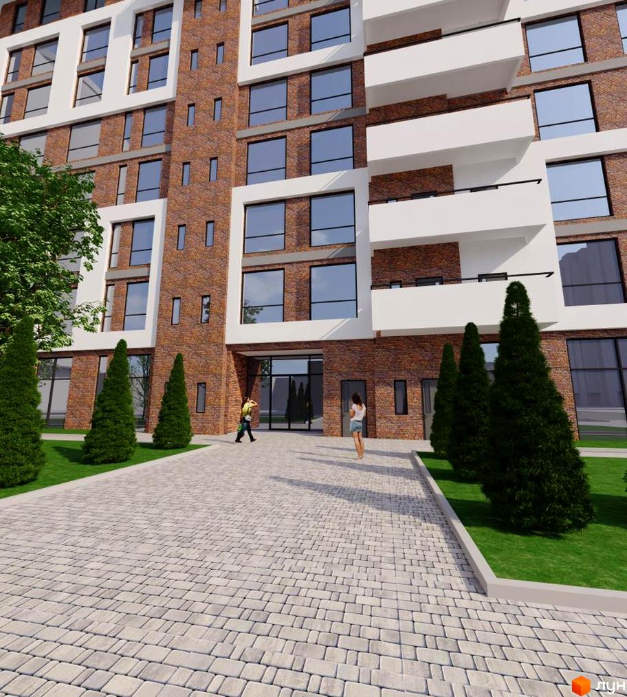 Житловий комплекс Loft White з цегляним фасадом та білими елементами, перед ним доглянута прибудинкова територія з газоном та деревами.