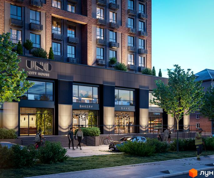 UNO City House - це новий житловий комплекс з фасадами з цегли та великими вікнами. На першому поверсі розташовані комерційні приміщення, а навколо будинку - зелена зона з деревами та місцями для відпочинку.