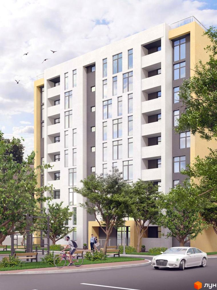 Висотна будівля ЖК Андріївський з білими фасадами та великими вікнами. На території комплексу є зелені насадження, лавки, велодоріжка та парковка.
