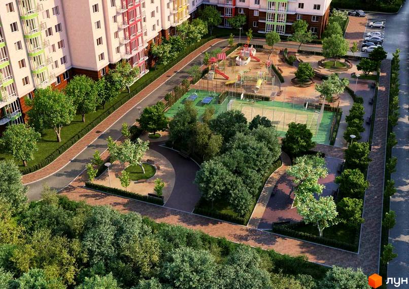 Житловий комплекс Садовий. Сучасна архітектура будівель та облаштована прибудинкова територія з дитячим майданчиком та зонами відпочинку.