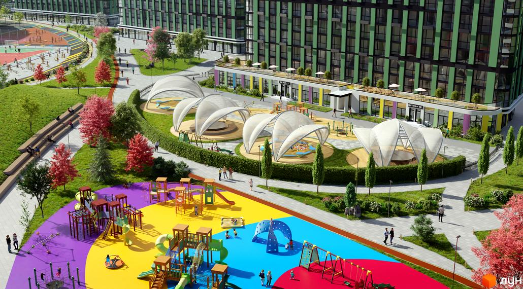 Житловий комплекс Great: зелені фасади будівель та різнокольорові дитячі майданчики з зонами відпочинку. Територія комплексу облаштована для комфортного життя.