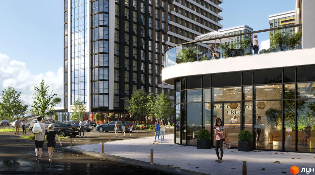 Зовнішній вигляд житлового комплексу Great з скляними фасадами та просторою прибудинковою територією. На території розміщені зелені насадження та місця для відпочинку.