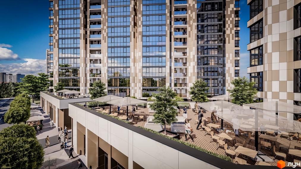 Житловий комплекс Comfort City Рибінський з фасадами з вікон та балконів. Тераса з парасолями та місцями для відпочинку.