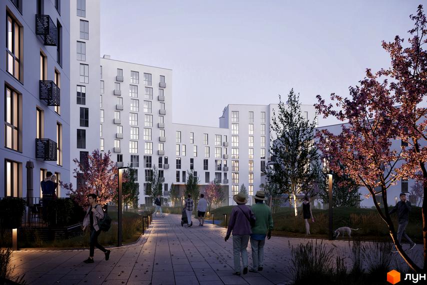 Житловий комплекс Малоголосківські пагорби: білі багатоповерхові будинки з балконами та зелена прибудинкова територія з алеєю для прогулянок. Сучасна архітектура та затишний простір для життя.