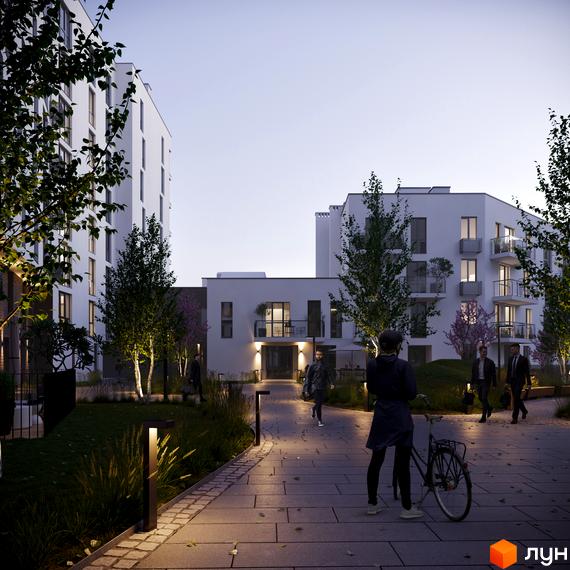 Житловий комплекс Малоголосківські пагорби. Сучасні білі будівлі з балконами та великими вікнами, освітлена алея з деревами та людьми, що гуляють.