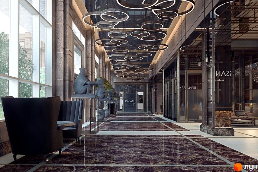 Інтер'єр холу ЖК Renaissance Residence з мармуровою підлогою, скульптурами мавп та круглими світильниками. Багато скляних дверей та вікон, що створюють відчуття простору та світла.