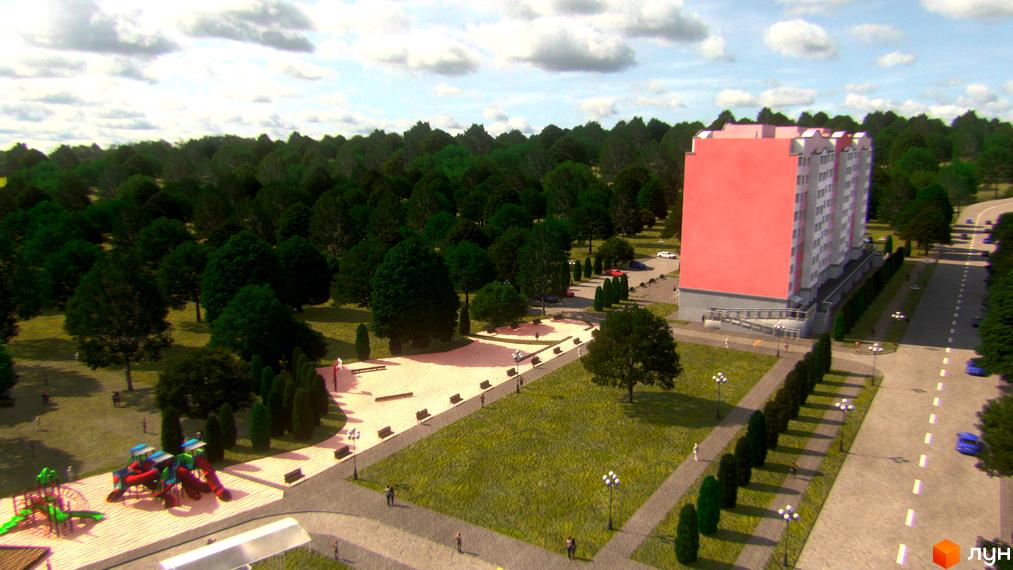 Зовнішній вигляд будинку ЖК Світанок з рожевим фасадом та прибудинковою територією з парком та дитячим майданчиком. Огляд житлового комплексу.