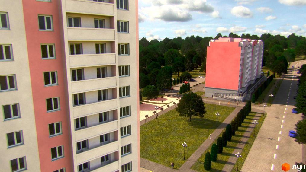 Житловий комплекс Світанок з рожевим фасадом та сірими елементами, що розташований біля зеленої зони з деревами та дорогою.