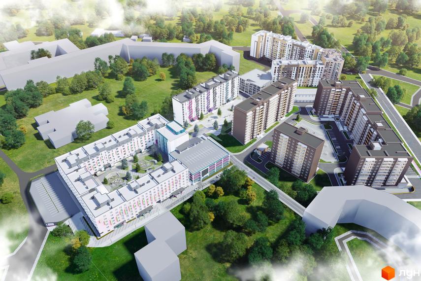 Вид на Житловий комплекс Синергія Glass з висоти пташиного польоту. Багатоповерхові будинки з паркінгом та прибудинковою територією з зеленими насадженнями.
