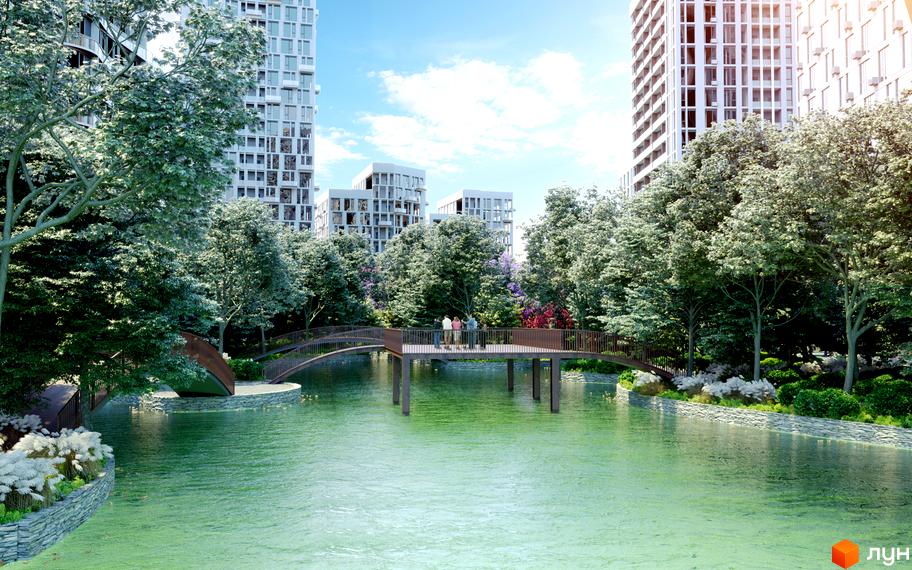 Житловий комплекс Creator City з мальовничим озером та мостом. Навколо комплексу багато зелені та дерев, що створює затишну атмосферу.