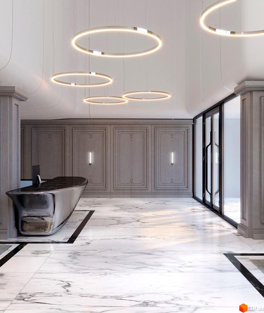 Сучасний дизайн холу ЖК Creator City з мармуровою підлогою та дизайнерськими світильниками. Просторий та світлий простір для комфорту мешканців.