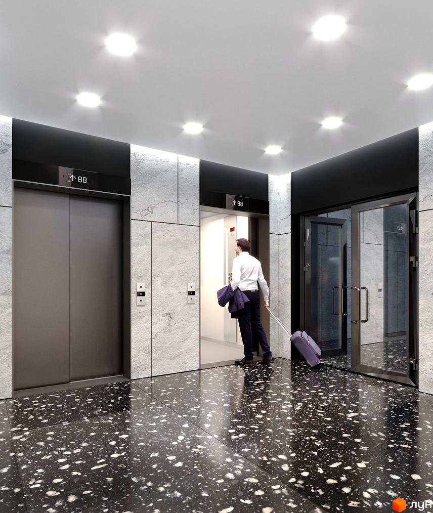 Сучасний інтер'єр холу житлового комплексу Creator City з ліфтами та чоловіком з валізою. Стильний дизайн та функціональність для мешканців.