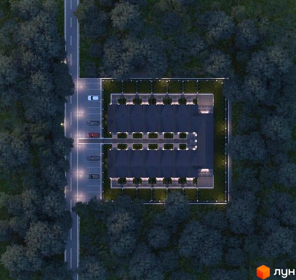 Вид зверху на таунхауси LEVEL. На території комплексу розташовані будинки з темним дахом, поруч парковка та дорога.