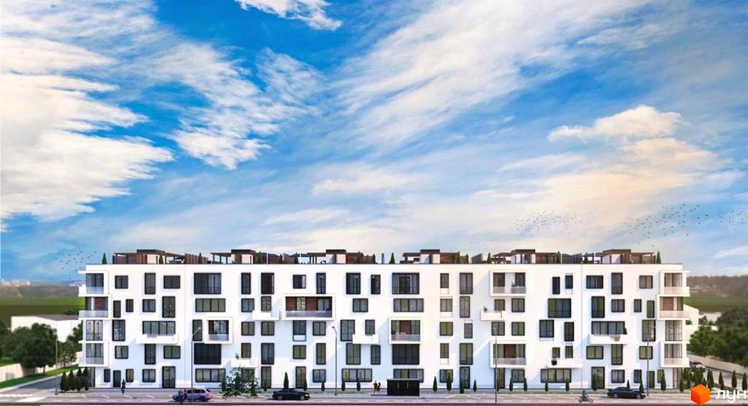 Житловий комплекс Sunrise City - фасади будівель з численними вікнами та балконами, зелена прибудинкова територія з деревами та доріжками.