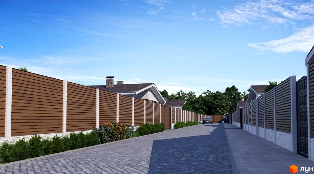 Котеджне містечко Данилівський: огороджена територія з будинками та бруківкою. Затишна вулиця з парканом та зеленими насадженнями.